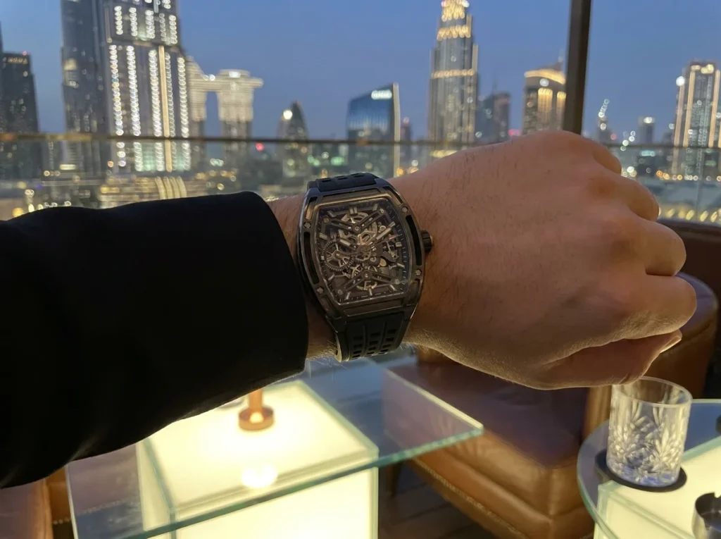 Richard Mille style replica watch in Dubai night lifestyle outfit
